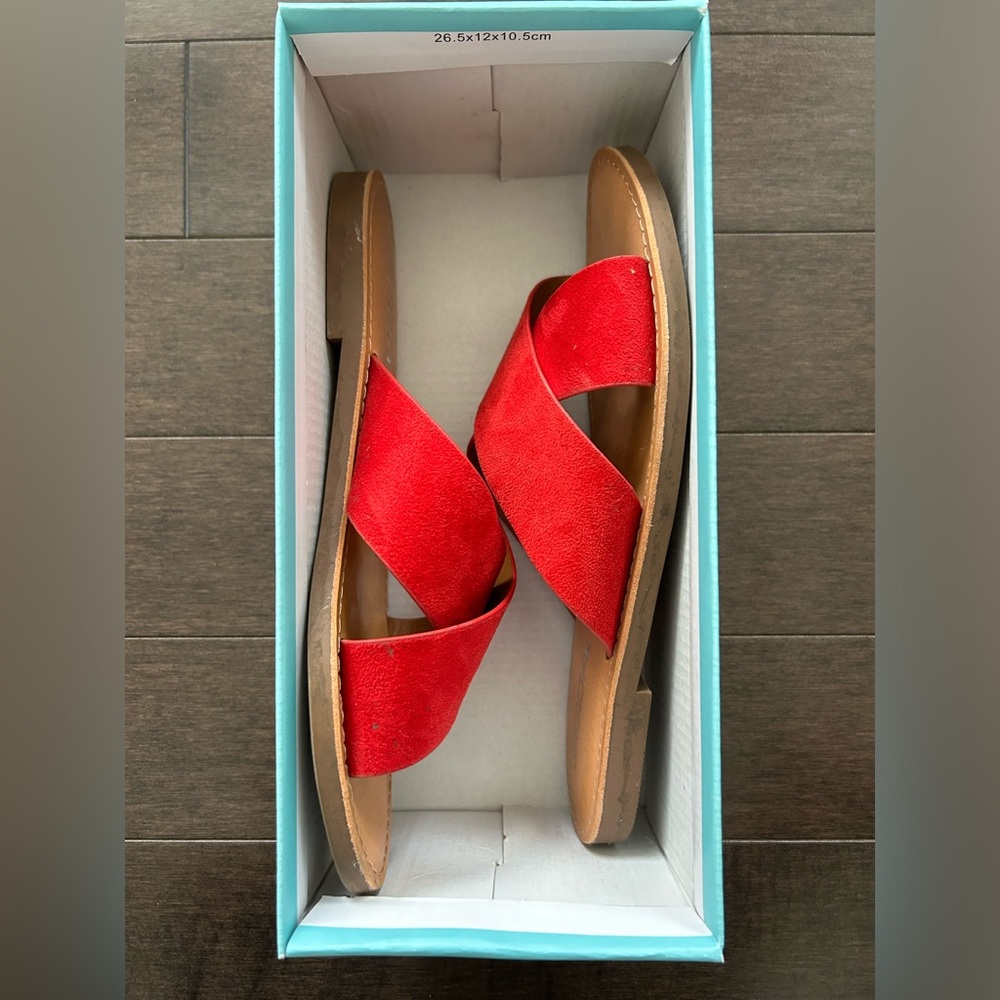 Red slip on sandals